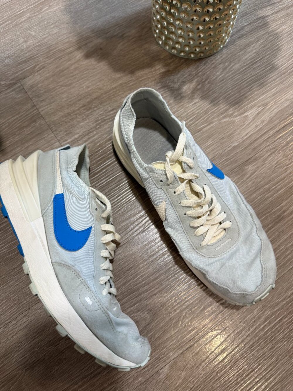 Sneakers	Nike	9.5	Blue, gray, and beige